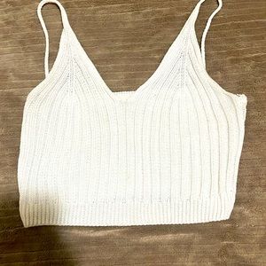 white (knitted?) crop top